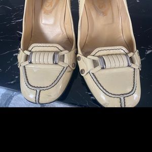 Tod's womens 40 stacked  heel tan shoes Tod shoes wear like iron.  Use evident.